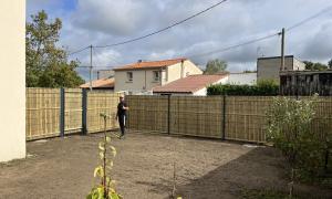 Pose de clôture en bois 